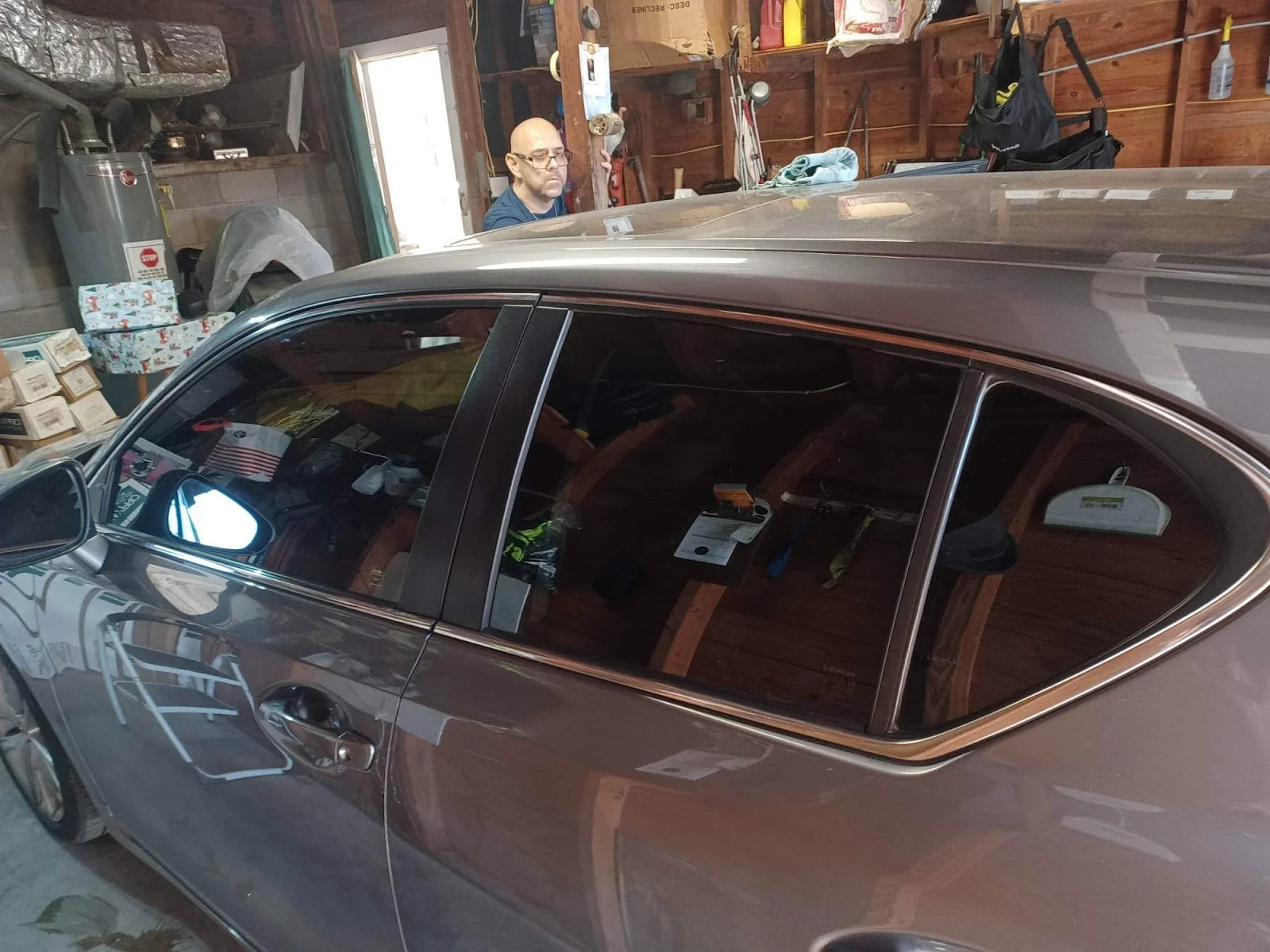 Inside TREVINO WINDOW TINT — shop interior and work bay